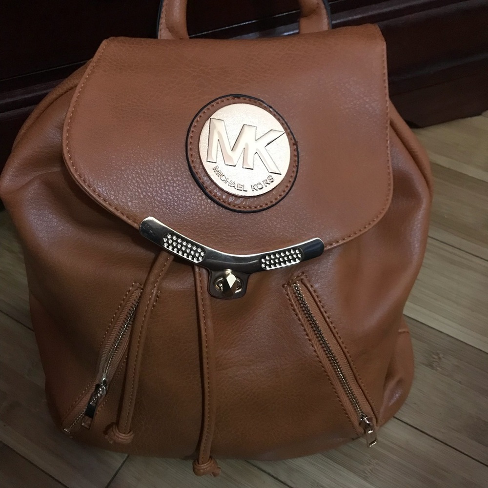 Woman’s brown backpack